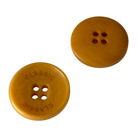 Steinnuss Knopf 15-20 mm hell-orange 4-Loch mit Rand mit klassischem Schrift-Detail