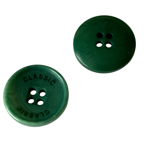 Steinnuss Knopf 20-23mm grün 4-Loch mit Rand mit klassischem Schrift-Detail